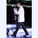 Andrei Xepkin brings the cup.