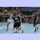 Marcus Ahlm is attacked by Tobias Karlsson and Thomas Mogensen.