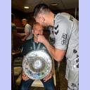 Harald Reinkind shaves Dr. Detlev Brandecker.